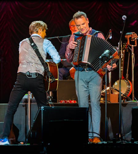 artist with an accordeon and bart peeters on guitar